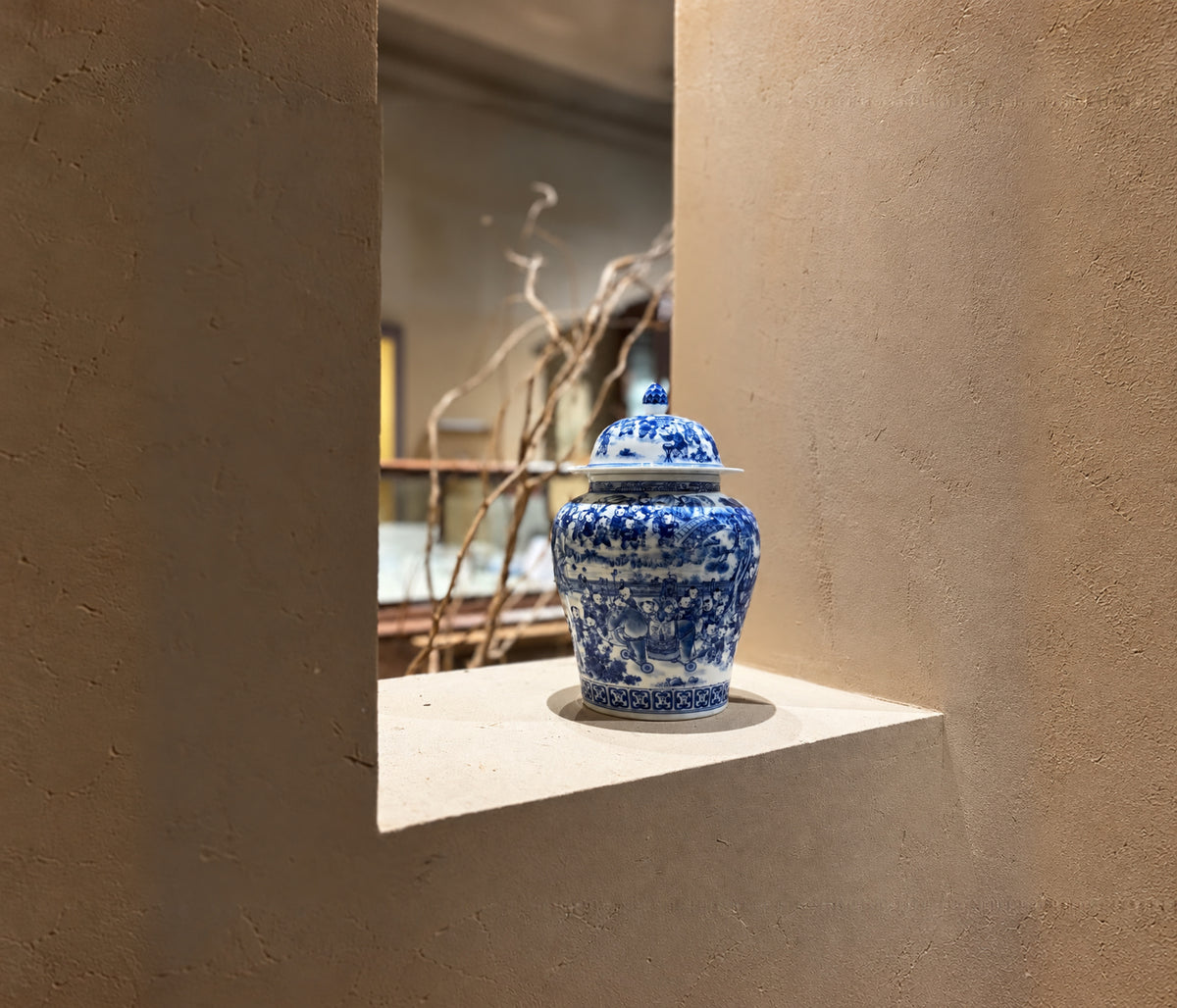 Lidded blue-and-white porcelain jar in natural light