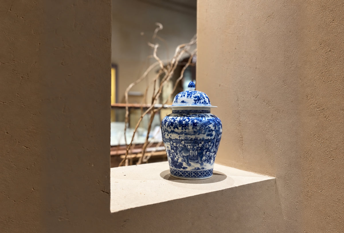 Lidded blue-and-white porcelain jar in natural light